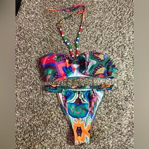 A beautiful, multicolor, adjustable swimsuit. A need for a tropical vacation🌴